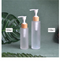 wholesale Frost 150ml 100ml glass bottle with bamboo wooden lotion sprayer pump Customized Made Cosmetic packaging